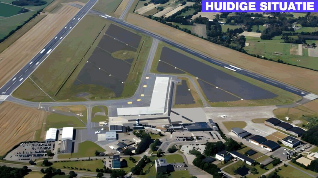 Grijs vliegveld met wat bedrijven 